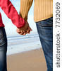 stock-photo-lovers-couple-holding-hands-on-beach-7732069.jpg